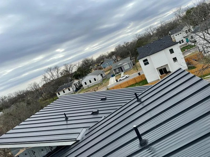 Standing seam metal roof panels with vents for Skylight Repair in Sunset